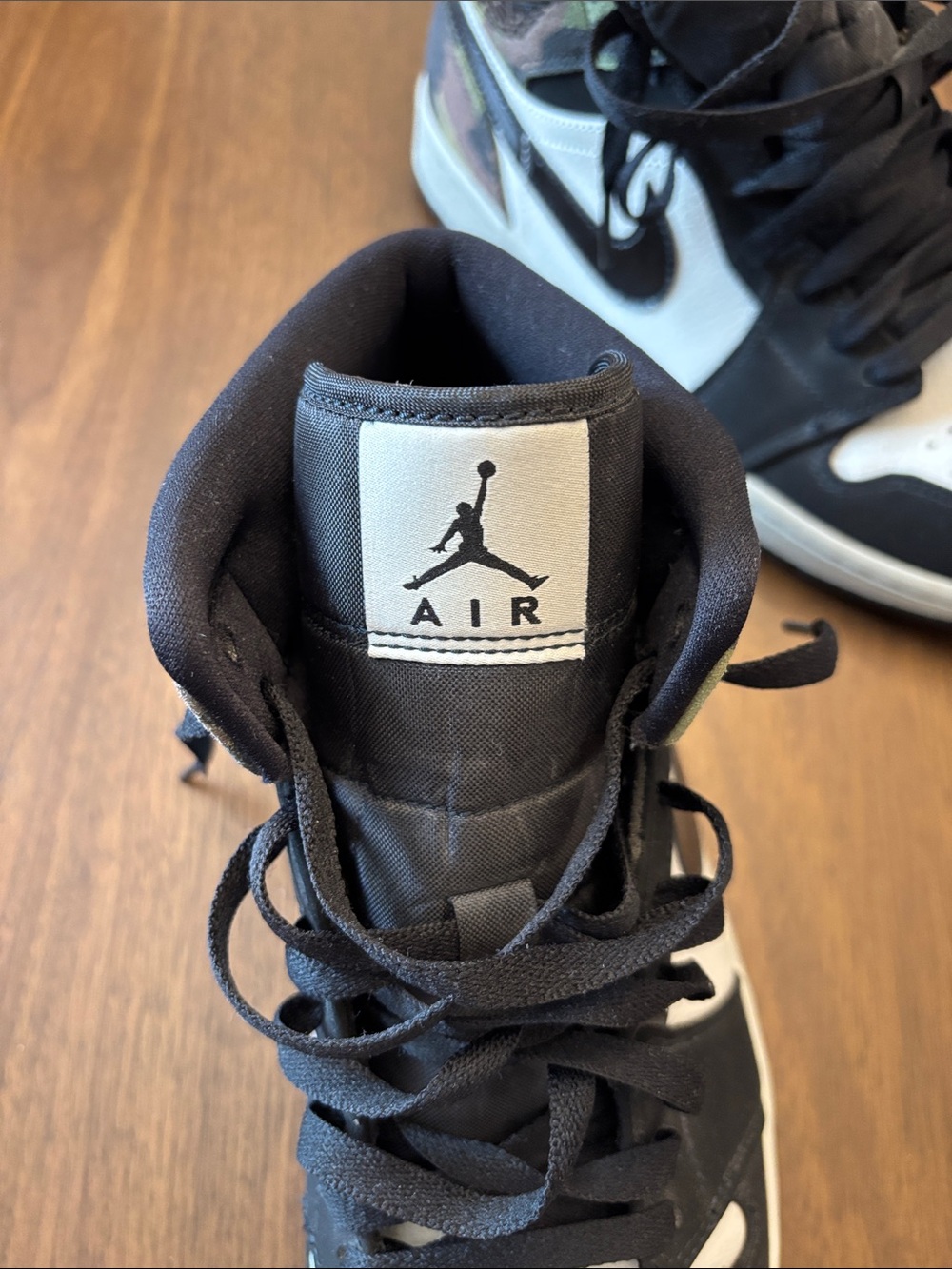 Nike Jordan 1 Men’s Black and White Mid-Top Sneakers with Camo Accent - Picture 5 of 5